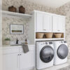 Wall Murals Delicate leafy branches on a warm cream background a00597v1