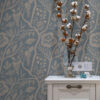 Wall Murals White flowers, stems and grapes on a blue background a00044